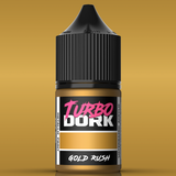 Bottle of Turbo Dork Gold Rush metallic paint on a gold background