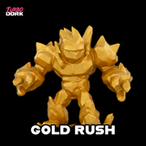 Gold robot figure with 'Gold Rush' text on a black background, featuring the brand 'Turbo Dork'.