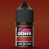 Bottle of Turbo Dork metallic paint with a red background