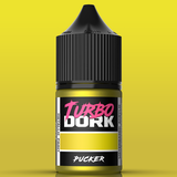 Bottle of Turbo Dork metallic paint on a yellow background