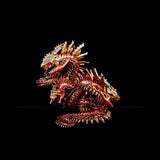 Metallic dragon sculpture on a black background