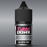 Bottle of Turbo Dork Silver Fox paint with black cap on a gray background