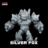 Toy figure of a creature named 'Silver Fox' with a black background and 'Turbo Dork' branding.