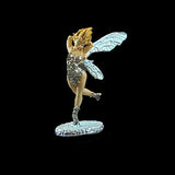 Decorative fairy figurine with wings on a black background