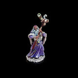 Fantasy figurine of a wizard with a staff on a black background