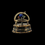 Decorative model of a solar system on a black background