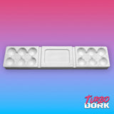White plastic model kit tray with multiple compartments on a gradient background with 'Turbo Dork' branding.