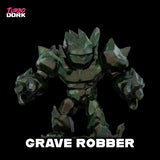 Toy figure labeled 'Grave Robber' with 'Turbo Dork' branding on a black background