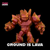 Toy figure with a lava-like texture on a black background, featuring the brand 'Turbo Dork'.