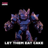 Metallic robot figure with 'Let Them Eat Cake' text on a black background, featuring the brand 'Turbo Dork'.