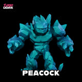 Blue robot-like figure with 'Turbo Dork' branding on a black background
