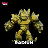Gold robot figure named 'Radium' with 'Turbo Dork' branding on a black background