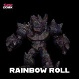 Toy figure with glittery rainbow pattern on a black background, branded 'Turbo Dork'.