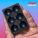 Black sphere mold held in a hand with 'Turbo Dork' branding in the corner.