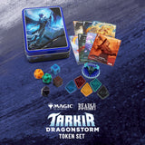 Tarkir Dragonstorm token set with trading cards and dice on a blue textured background