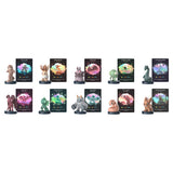 Collection of small figurines with corresponding cards on a white background