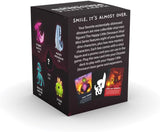Black box packaging for collectible vinyl mini figures with dinosaur illustrations and text.