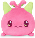 Pink plush toy with green horns on a white background