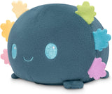 Plush toy with colorful flower-like appendages on a white background