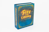 Board game titled 'Fire in the Library' with blue cover and gold text on a white background