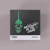 Box for 'Werewolf in the Dark' game with green monster face design on a gray background