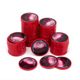 Stacks of red and black circular objects on a white background