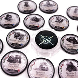Collection of round game pieces with various designs and text on a white background