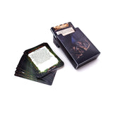 Set of cards with a deck holder on a white background