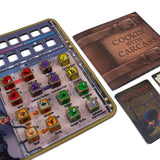 Board game components including dice and cards on a white background