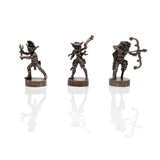 Three bronze figurines of archers on a white background