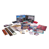 Collection of board game components including cards, dice, and boxes on a white background
