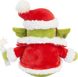 Plush toy resembling a Christmas elf with a red hat and coat on a white background