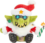 Plush toy with a green face, red hat with a star, and black shoes on a white background