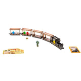 Toy train set with figures and cards on a white background