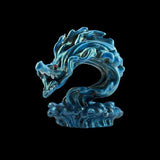 Blue dragon figurine on a black background