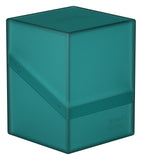 Teal card storage box with 'Ultimate Guard' branding on a white background