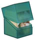 Teal card game box with a clear lid showing cards inside, on a white background
