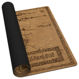A rolled-up playmat mat featuring an ancient map design inspired by 'The Lord of the Rings' wilderland, with a textured black top surface and a tan parchment-style 