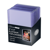 A 25-pack of Ultra PRO 3 x 4 inch Platinum Toploaders in a black retail box with a stack of translucent purple-blue toploaders visible at the top.