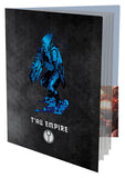 Book or notebook with a robot illustration and 'T u Empire' text on a dark cover.