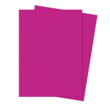 Two overlapping solid magenta sheets on a flat green background.