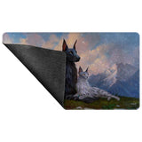 Mouse pad with fantasy design of two mythical creatures against a mountain and sky background