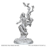 Unpainted fantasy figurine with tree-like design on a white background