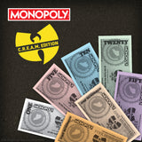 Monopoly C.R.E.A.M. Edition money cards with Wu-Tang Clan logo on a dark background