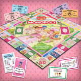 Strawberry Shortcake Monopoly board game on a pink background