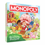 Monopoly board game box featuring Strawberry Shortcake characters on a colorful background