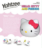 Front of a Yahtzee game package for the Hello Kitty and Friends version, showing the white Hello Kitty figure with a red bow, several dice, and pink packaging graphics with product text.