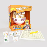 Naruto Shippuden Yahtzee board game set with an orange branded box, a white bowl, several white dice, a scoring pad, and a yellow pencil on a light gray background.