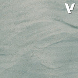 Textured gray surface with a logo in the top right corner