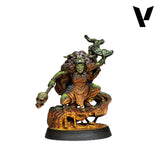 Statue of a fantasy character with green skin and a staff on a white background